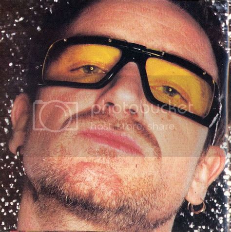 why does bono wear yellow glasses|bono from u2 glasses.